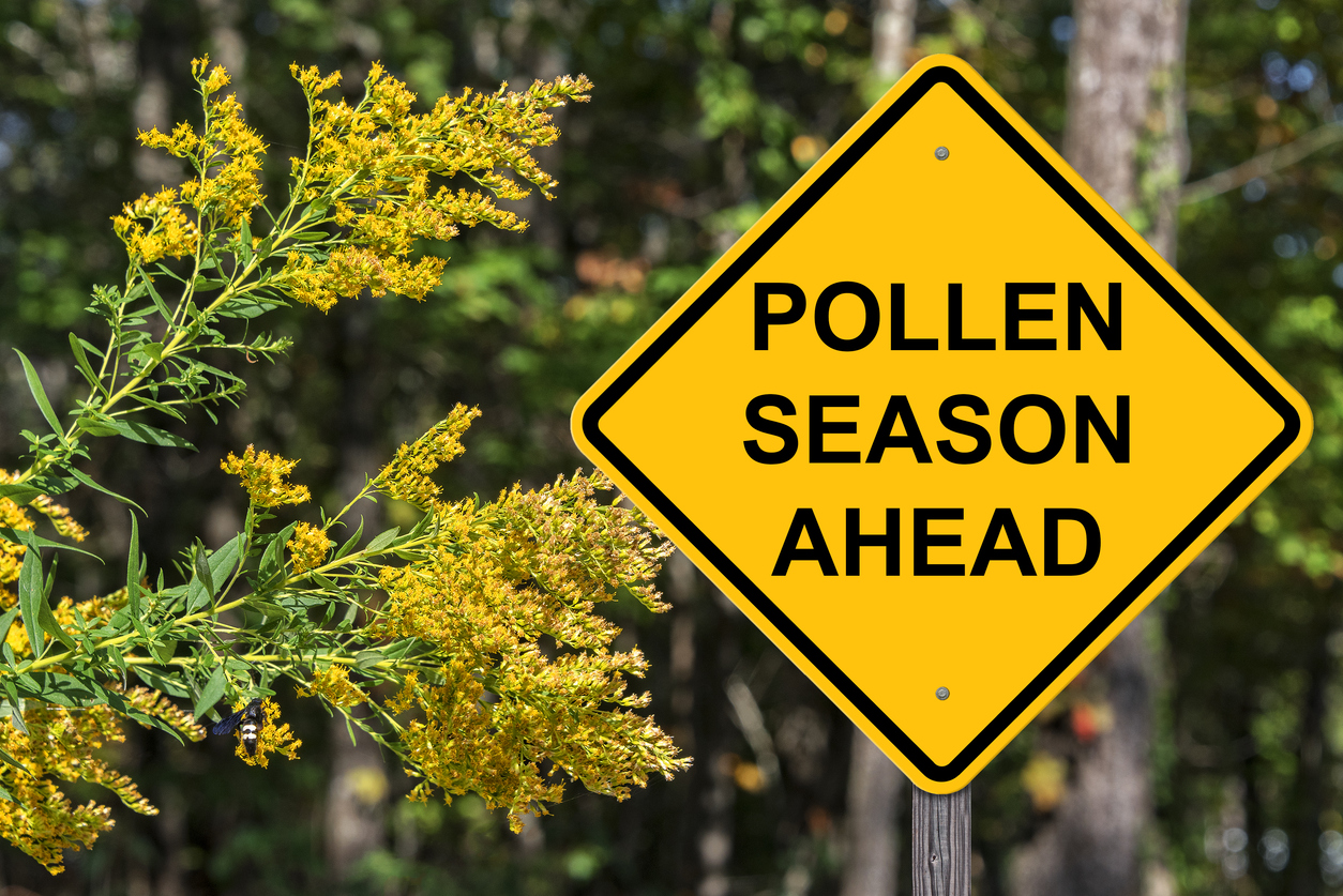 The image shows a sign with "Pollen Season Ahead" to introduce steps you can take to prepare for seasonal allergies.